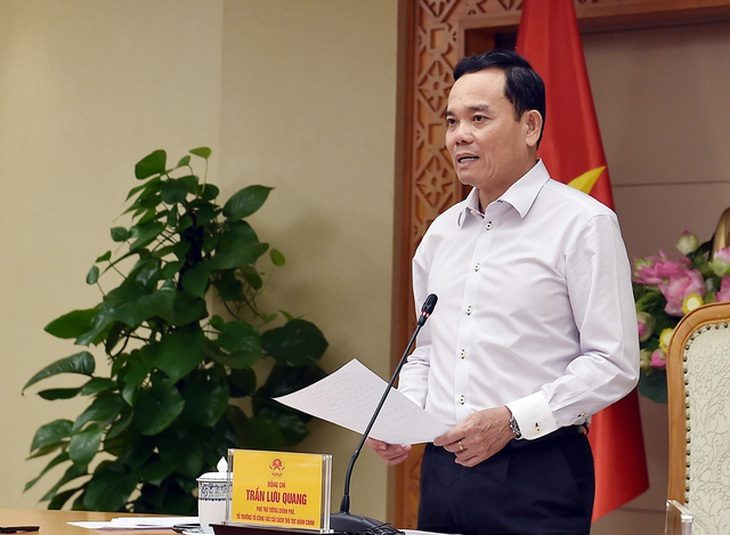 4 địa phương thí điểm thủ tục hành chính không phụ thuộc địa giới- Ảnh 1. Phó thủ tướng Trần Lưu Quang chủ trì cuộc họp - Ảnh: VGP